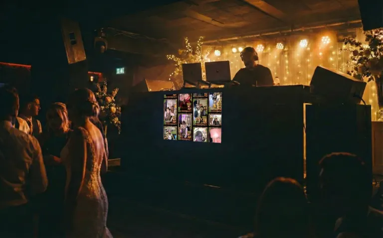 Capture Snaps event software displayed alongside a DJ setup